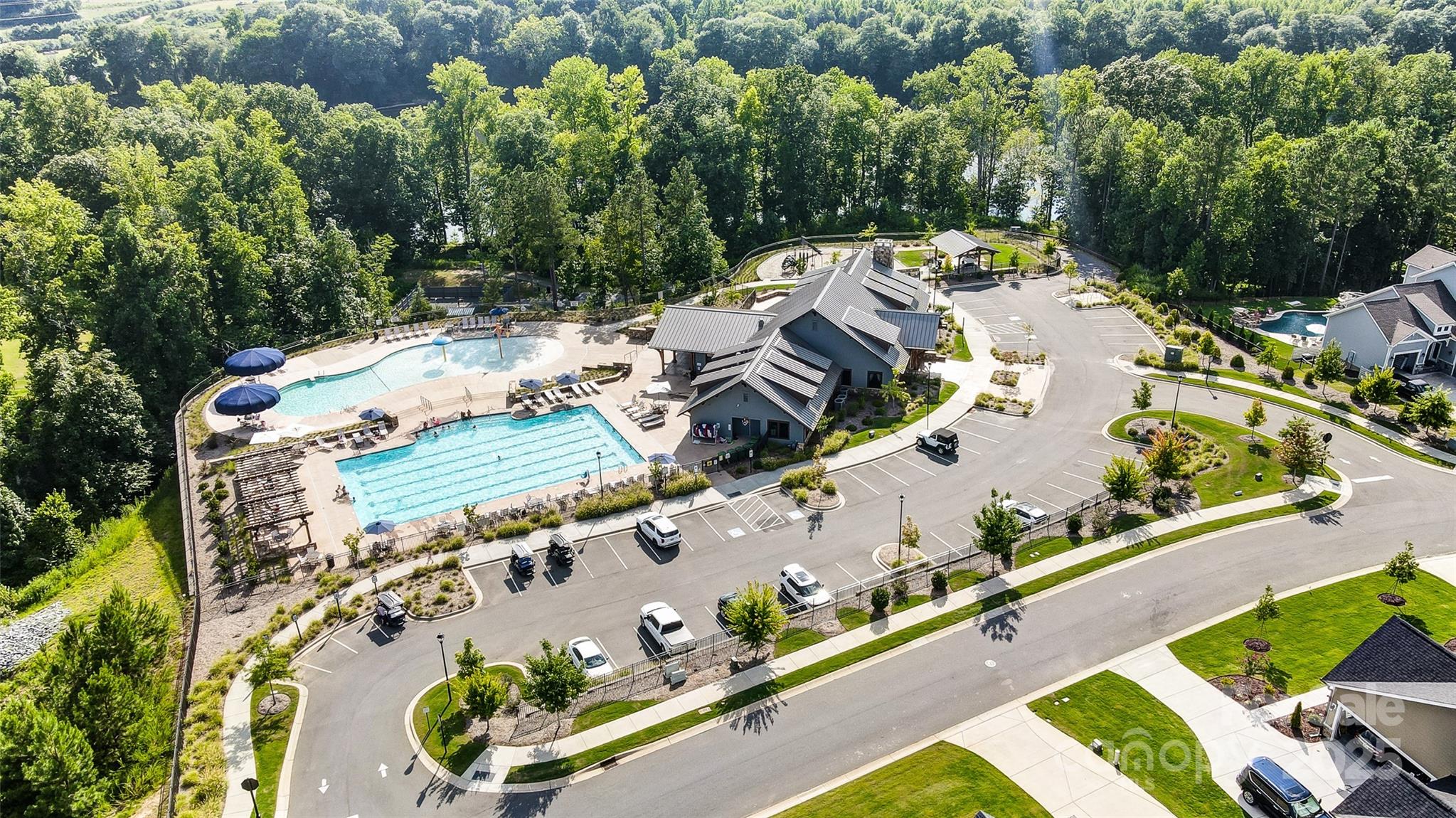 1908 Masons Bend Drive Fort Mill, SC 29708 - Photo 44 of 45 an aerial view of a house with a swimming pool and outdoor seating