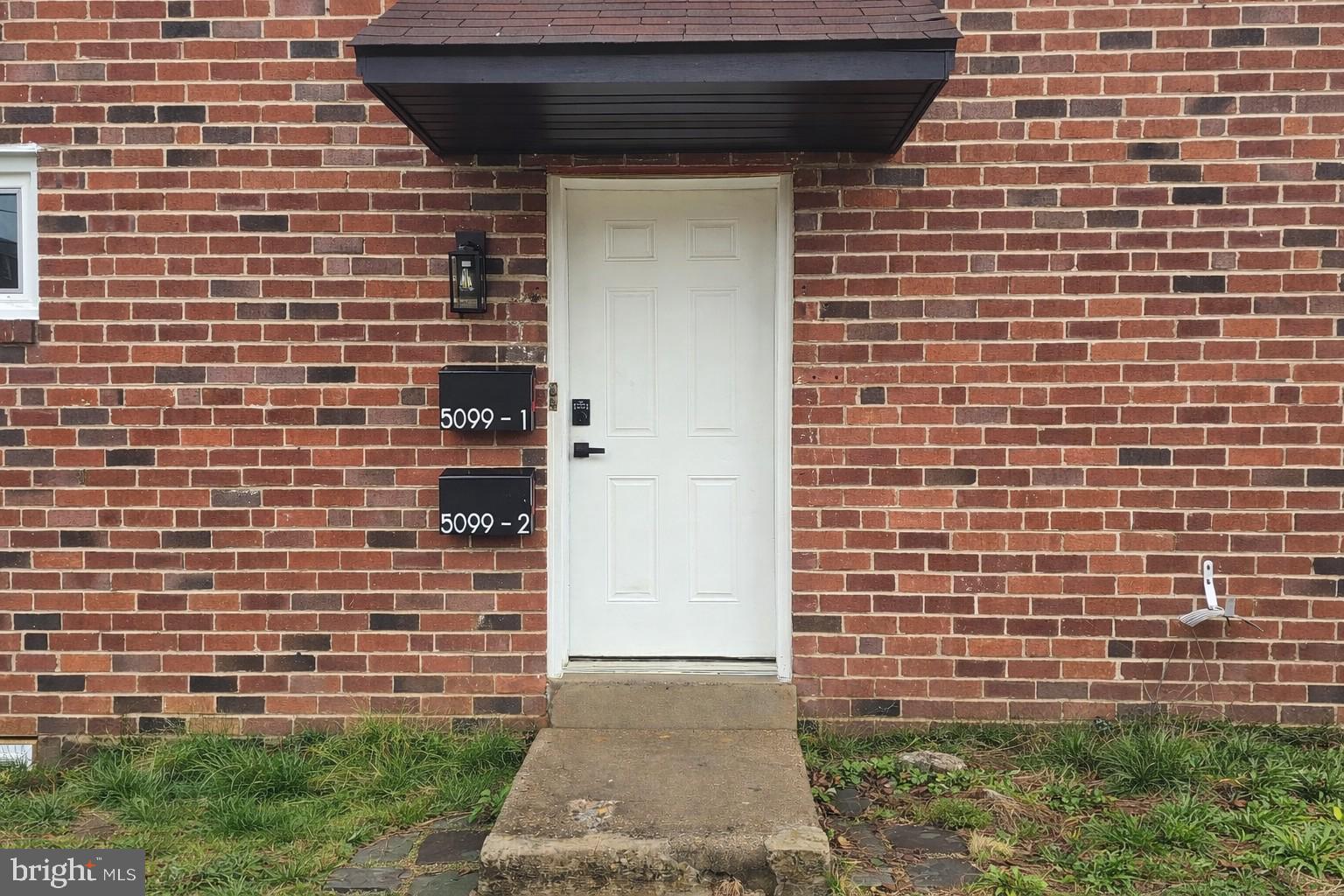 5099 Palmers Mill Road, Unit 2 Clifton Heights, PA 19018 - Photo 2 of 11 a view of a brick wall