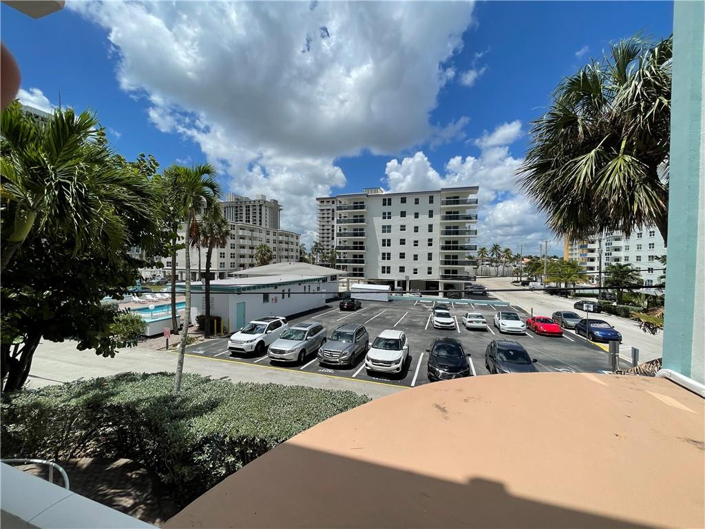 1801 South Surf Road, Unit 2F Hollywood, FL 33019 - Photo 17 of 22 a cars parked in front of a house