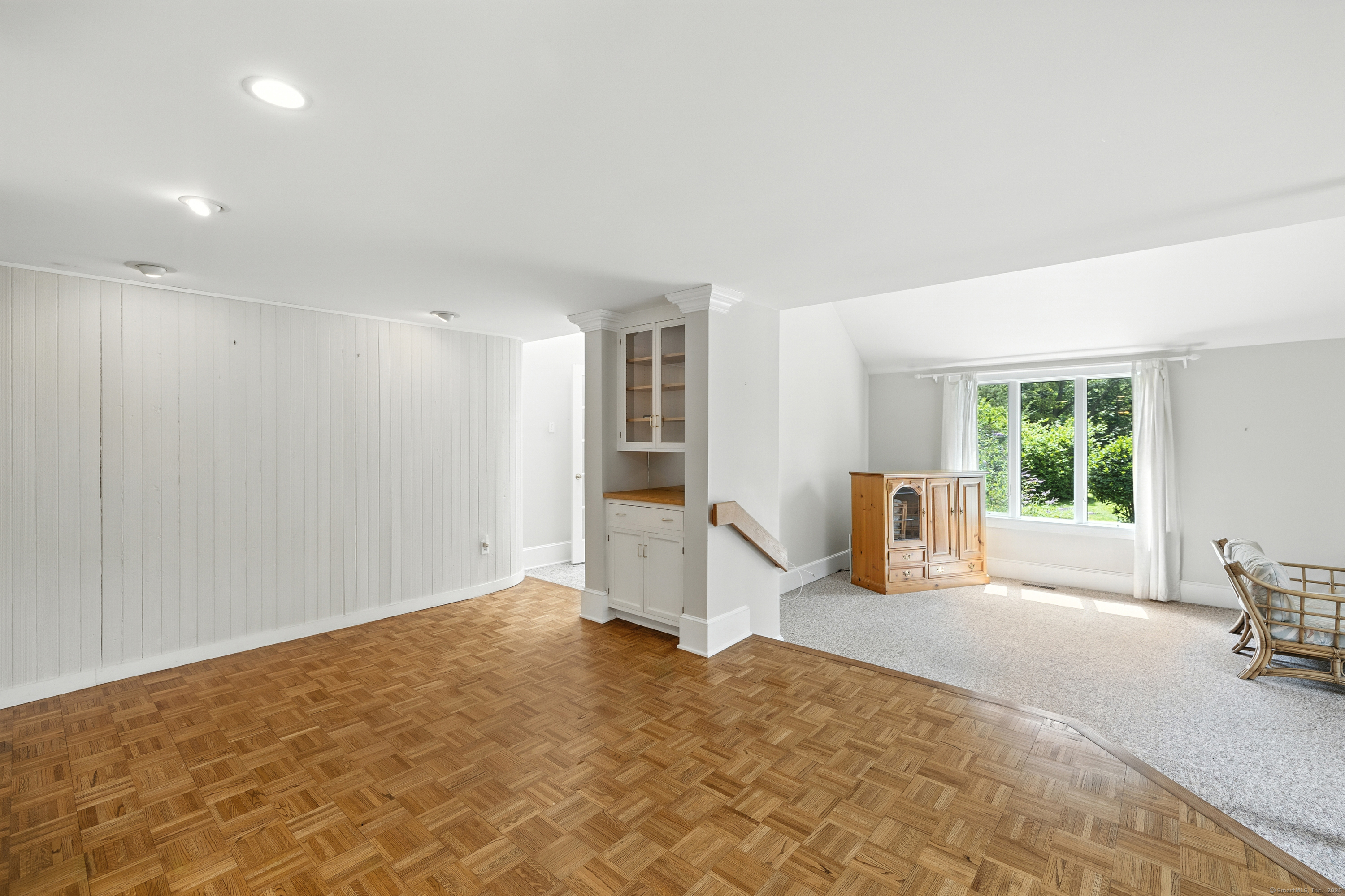 326 Litchfield Road New Milford, CT 06776 - Photo 12 of 40 a view of a livingroom with furniture and staircase