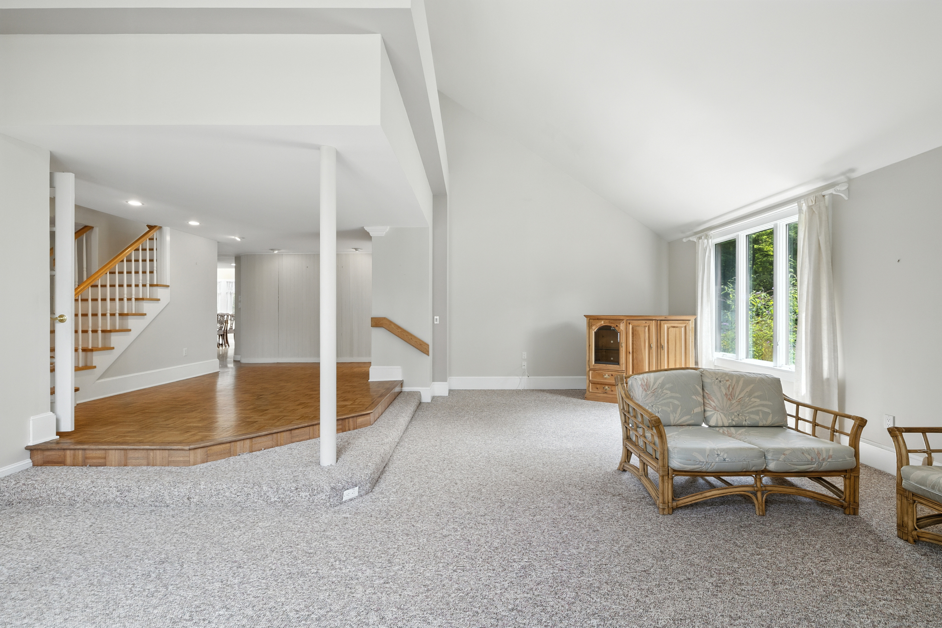 326 Litchfield Road New Milford, CT 06776 - Photo 13 of 40 a living room with furniture and a large window