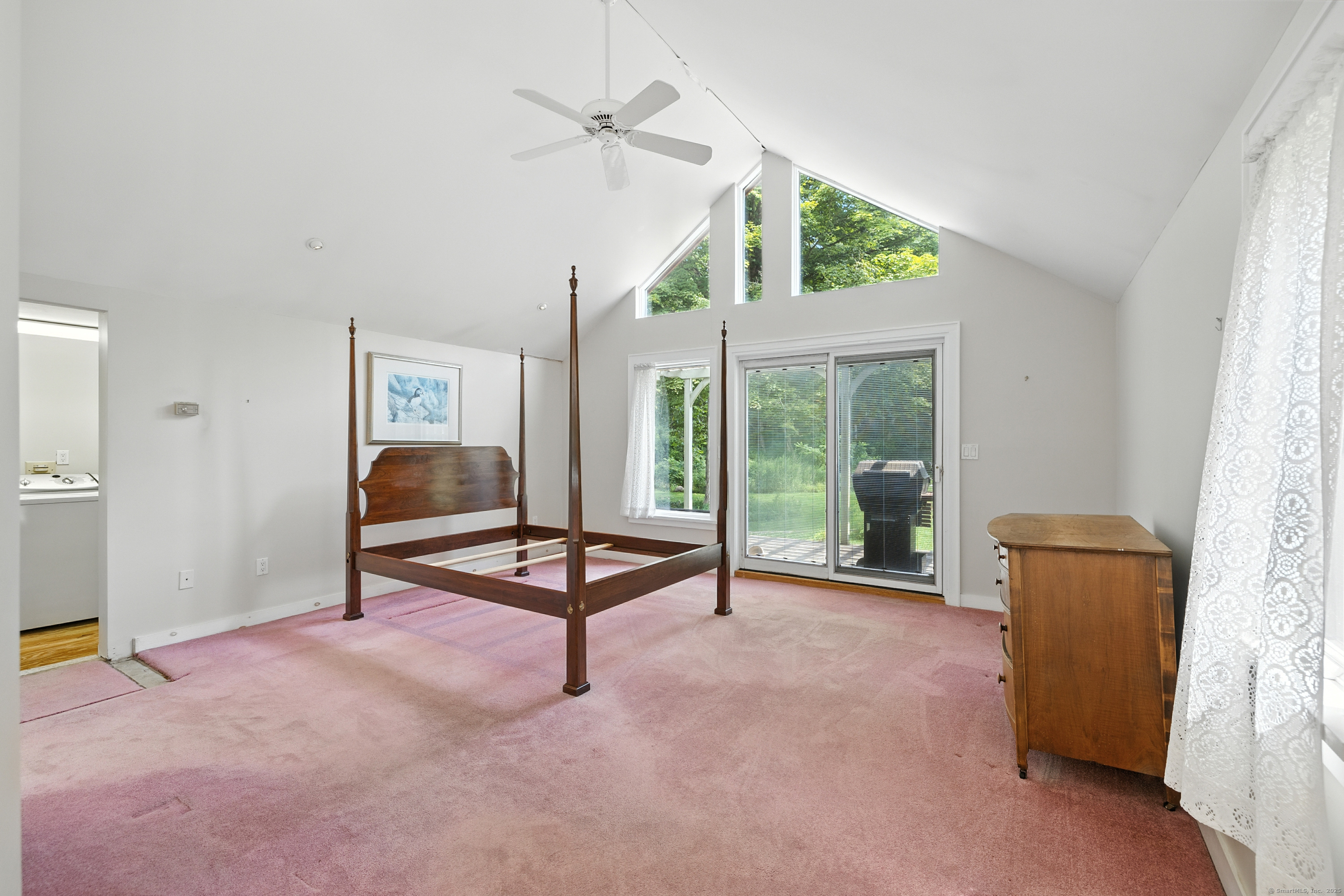 326 Litchfield Road New Milford, CT 06776 - Photo 19 of 40 a view of a livingroom with furniture and a ceiling fan