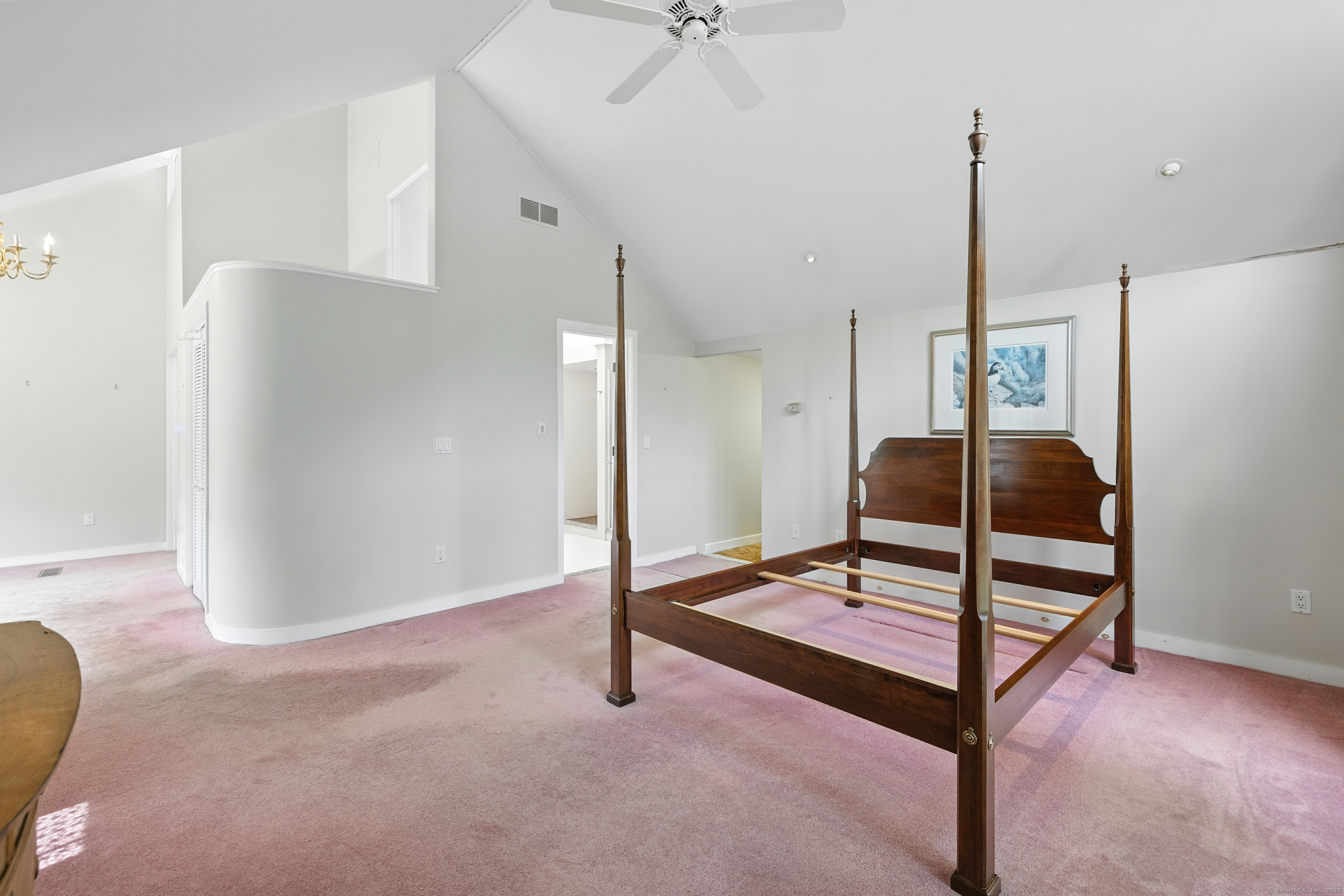 326 Litchfield Road New Milford, CT 06776 - Photo 20 of 40 a living room with furniture and a chandelier