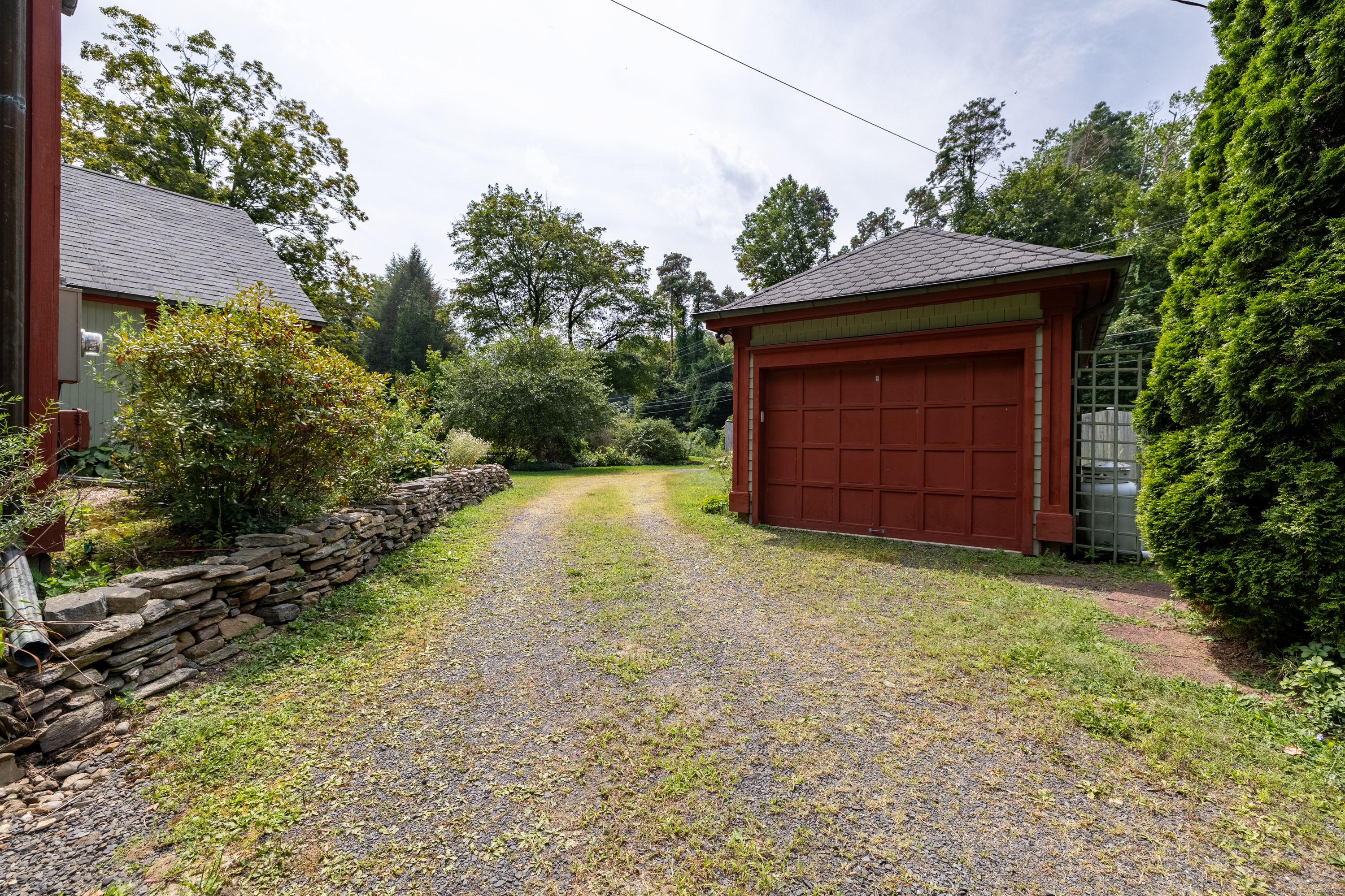 326 Litchfield Road New Milford, CT 06776 - Photo 32 of 40 a house view with a backyard space