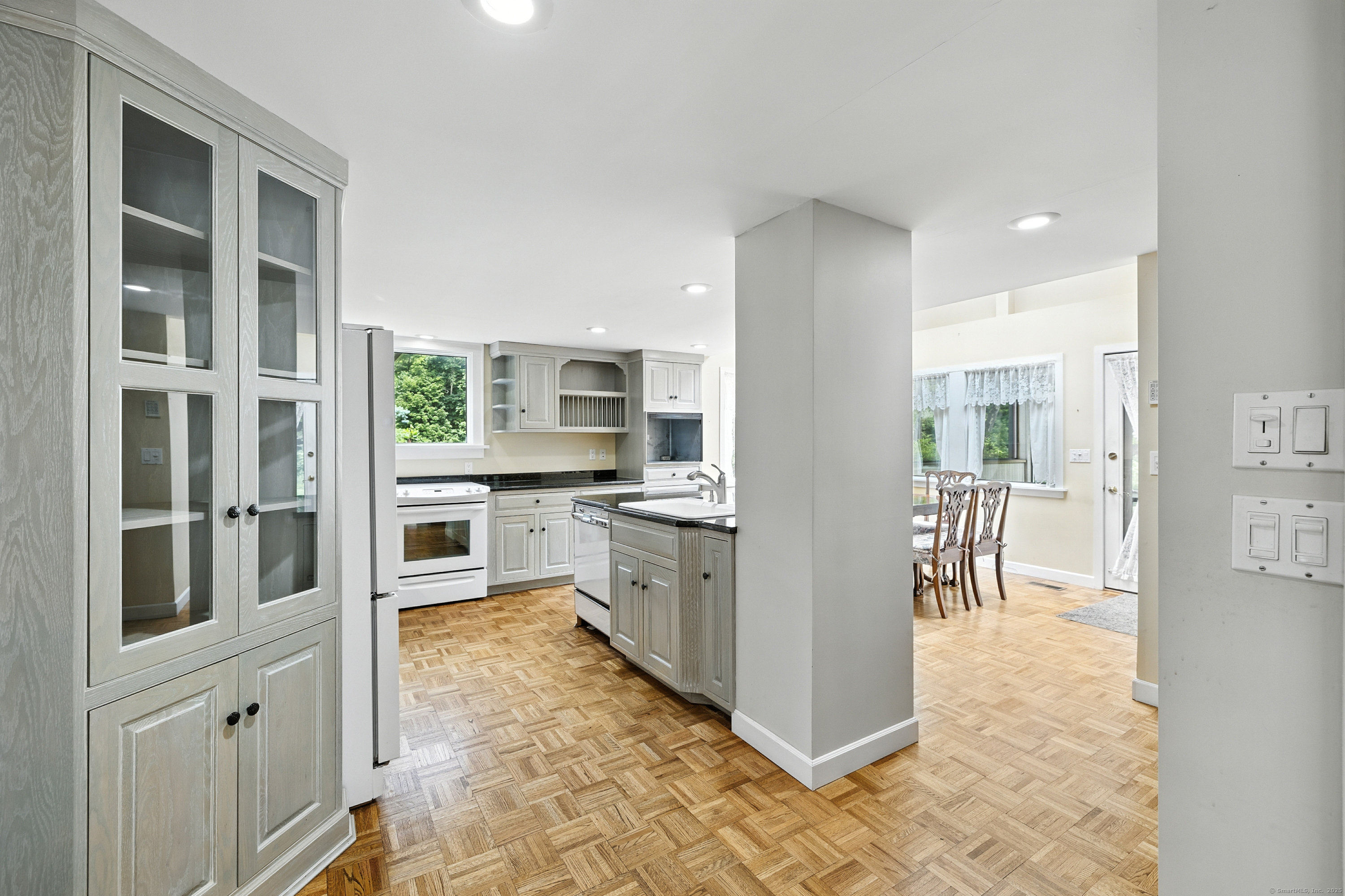 326 Litchfield Road New Milford, CT 06776 - Photo 4 of 40 a kitchen with stainless steel appliances granite countertop a refrigerator and a sink