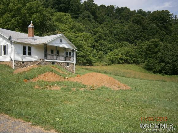 600 Wilson Branch Road Canton, NC 28716 - Photo 20 of 24 a front view of a house with a yard