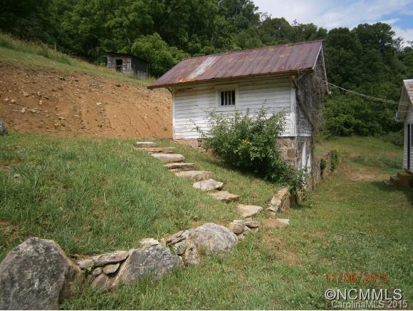600 Wilson Branch Road Canton, NC 28716 - Photo 5 of 24 a view of a house with a yard
