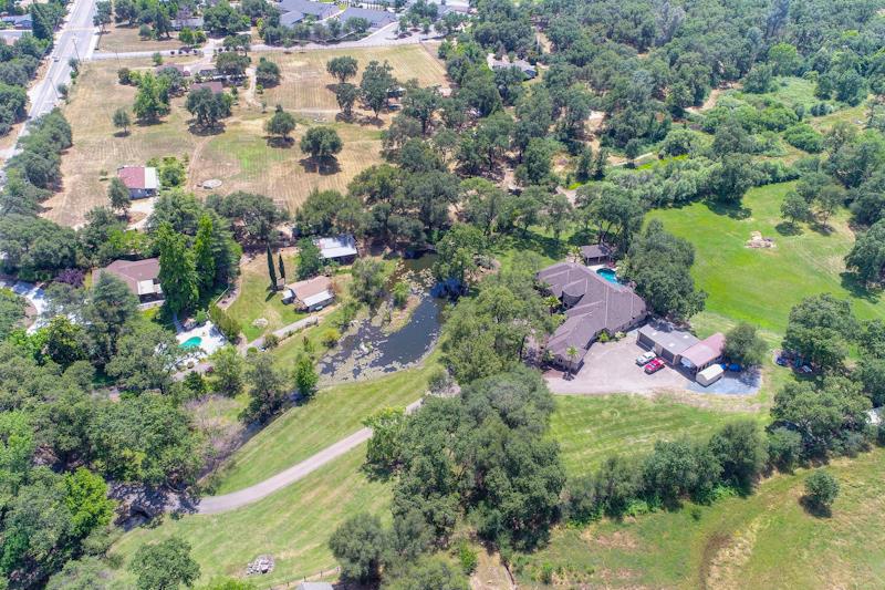 3164 Humphrey Road Loomis, CA 95650 - Photo 28 of 33 an aerial view of residential houses with outdoor space and trees