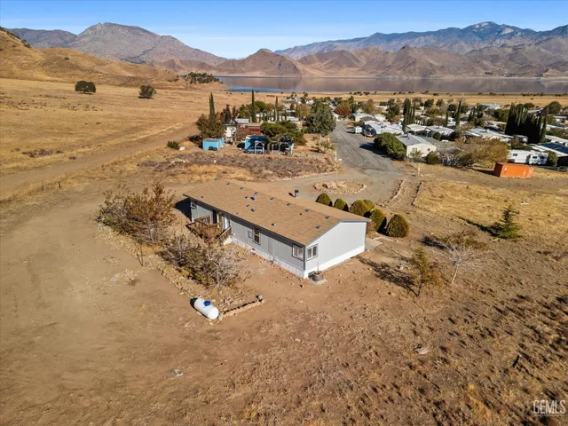 a view of a mountain with sitting area