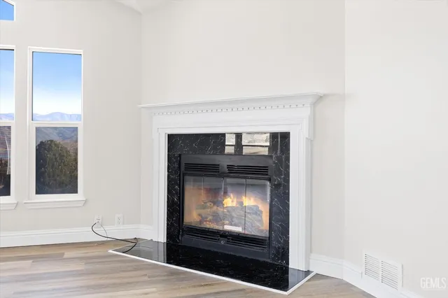 a living room with a fireplace