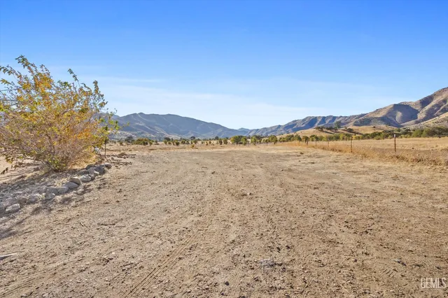 a view of an ocean and a mountain