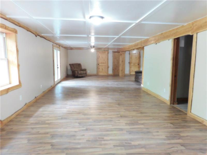 122 Porter Road Harrisville, PA 16038 - Photo 4 of 20 Dining Room/Living Room combo 45x14'