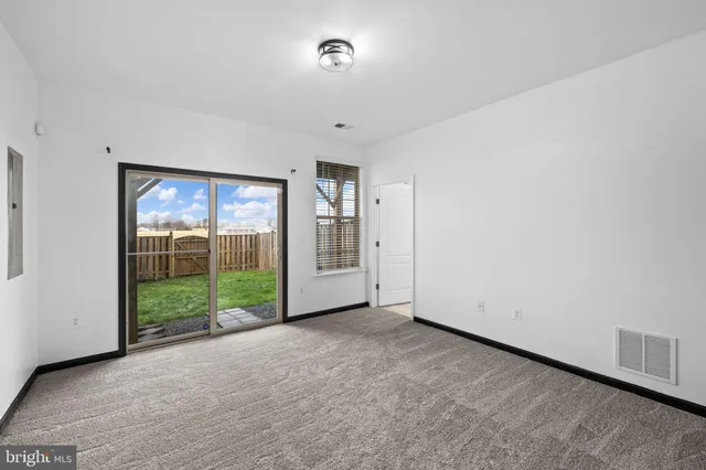a view of livingroom with front door