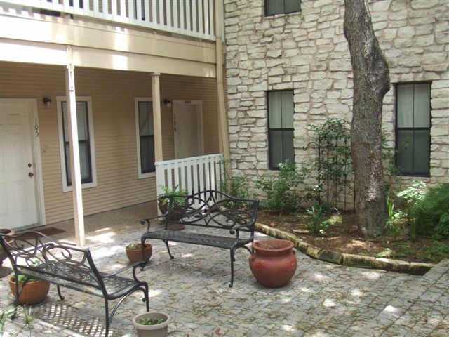 4401 Speedway, Unit 302 Austin, TX 78751 - Photo 1 of 1 a view of a patio with couple of chairs and a potted plant