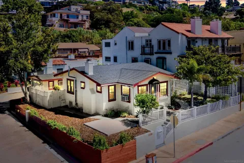 a front view of a house with a porch