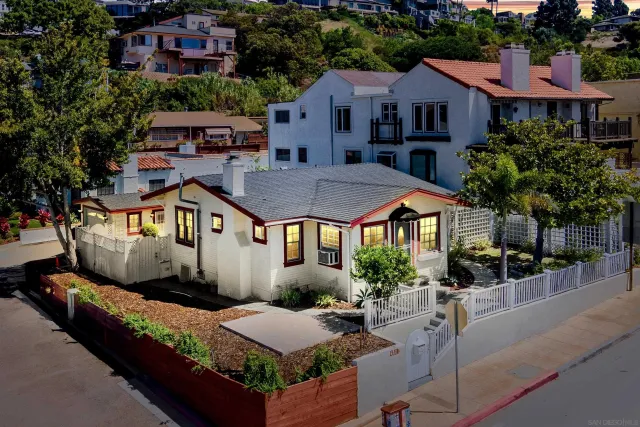 a front view of a house with a porch