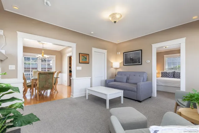a kitchen with stainless steel appliances granite countertop a refrigerator and a stove