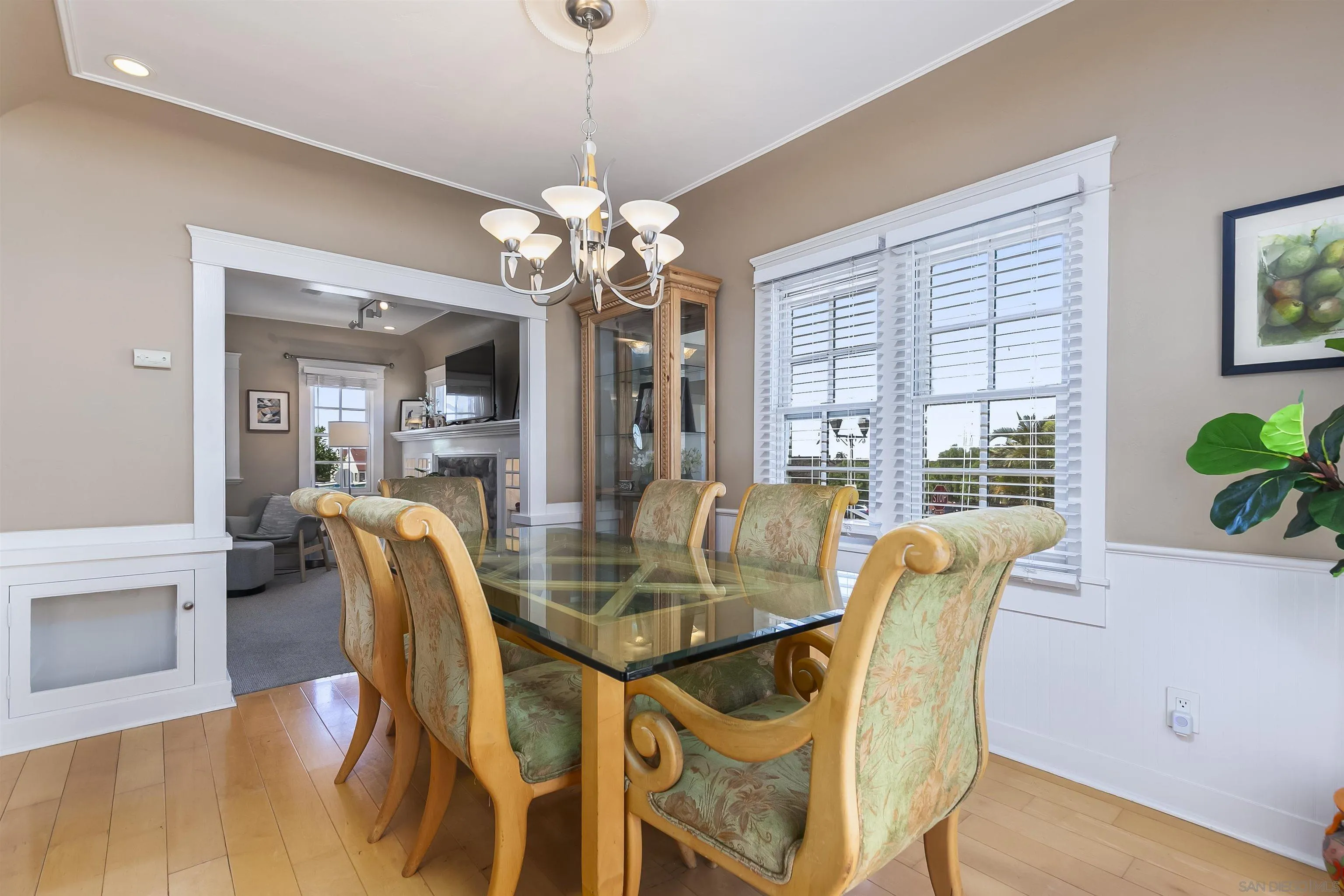 2544 Juan Street San Diego, CA 92110 - Photo 15 of 54 a view of a dining room with furniture window and wooden floor