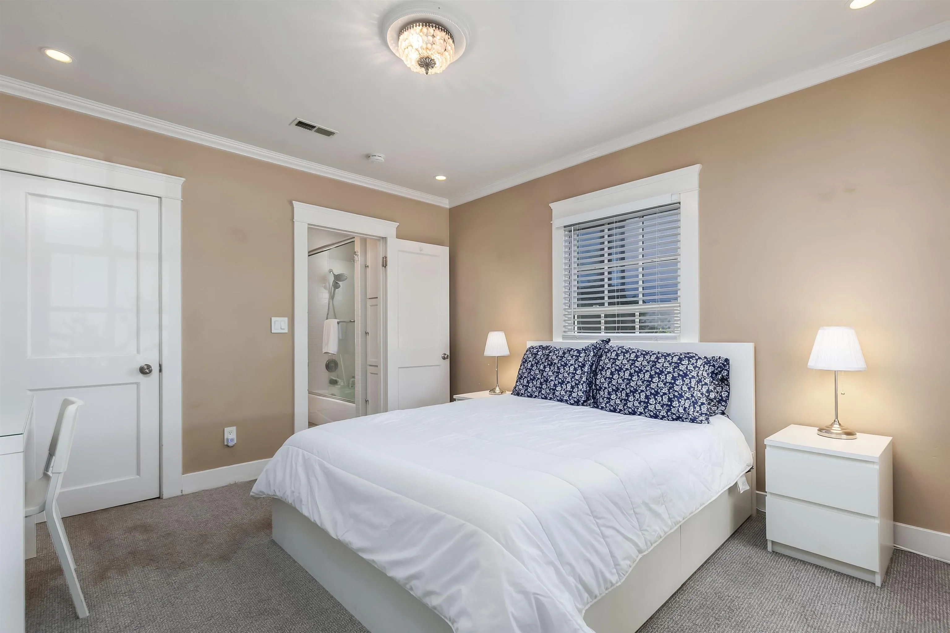 2544 Juan Street San Diego, CA 92110 - Photo 7 of 54 a bedroom with a bed and a lamp