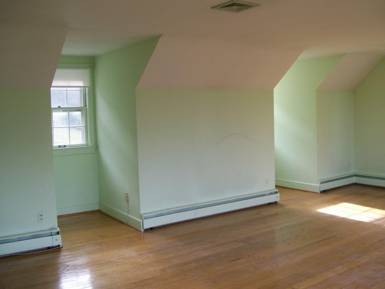 3434 West Ridge Road Southwest Roanoke, VA 24014 - Photo 13 of 16 an empty room with wooden floor and windows