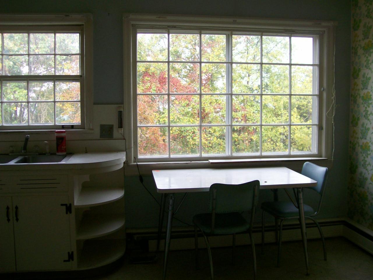 3434 West Ridge Road Southwest Roanoke, VA 24014 - Photo 10 of 16 a view of a dining room with furniture and window