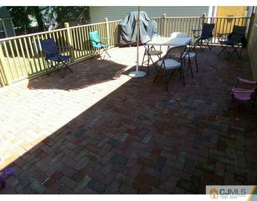 168 South Hill Road Colonia, NJ 07067 - Photo 6 of 8 a view of a patio with iron fence