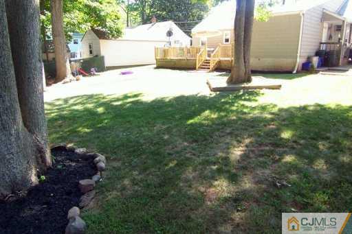 168 South Hill Road Colonia, NJ 07067 - Photo 8 of 8 a view of a house with a yard