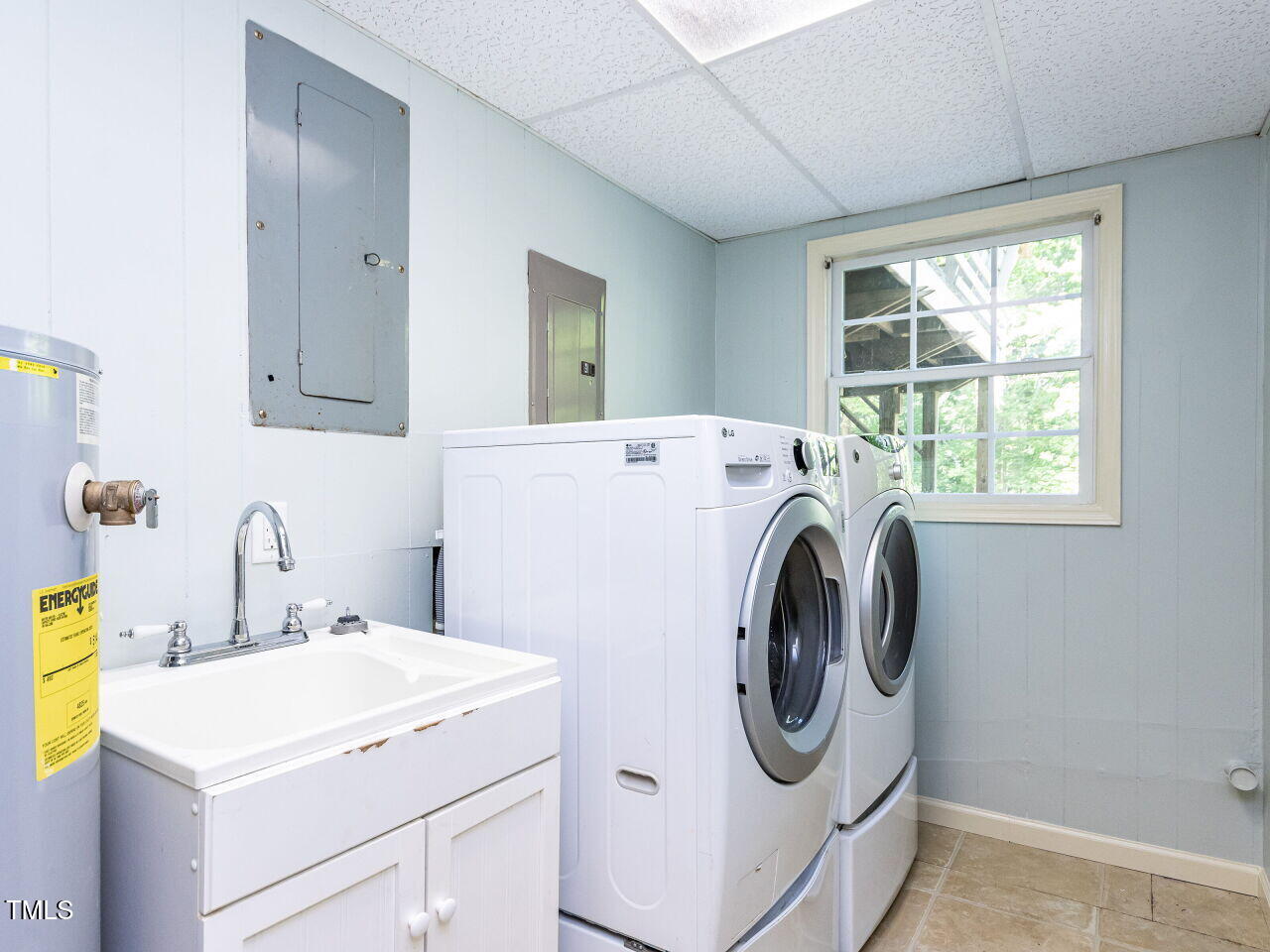 525 Turtle Creek Farm Road Apex, NC 27523 - Photo 17 of 36 a utility room with dryer and washer