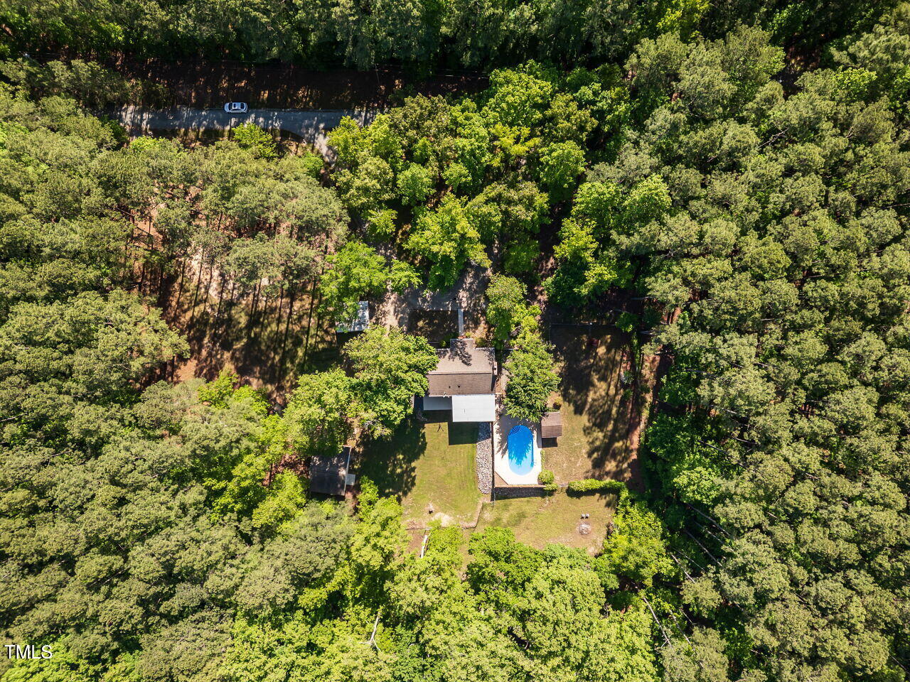 525 Turtle Creek Farm Road Apex, NC 27523 - Photo 19 of 36 a view of a garden with a tree