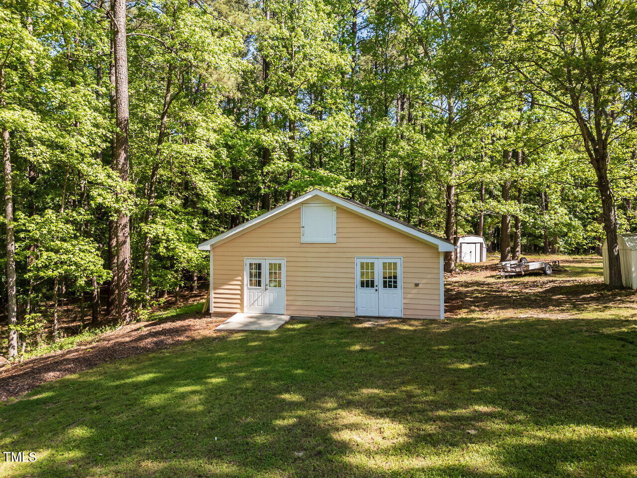 525 Turtle Creek Farm Road Apex, NC 27523 - Photo 23 of 36 a view of a house with a yard