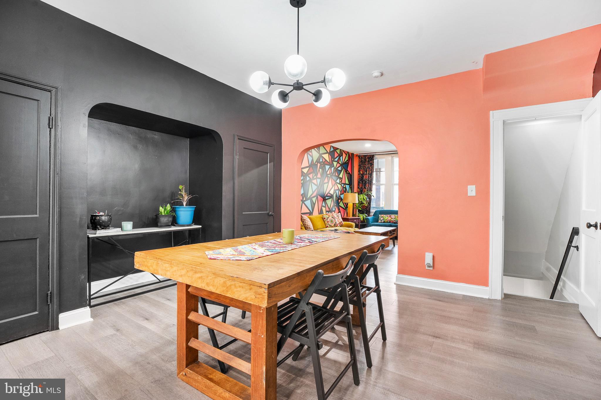 2750 Pelham Avenue Baltimore, MD 21213 - Photo 9 of 33 Dining Area Flows Into Bright Living Room