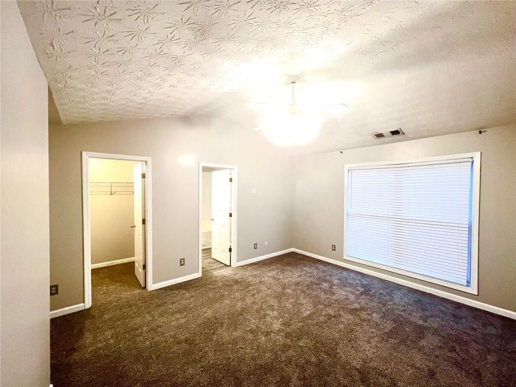 3854 Austin Park Lane Decatur, GA 30032 - Photo 24 of 44 an empty room with windows