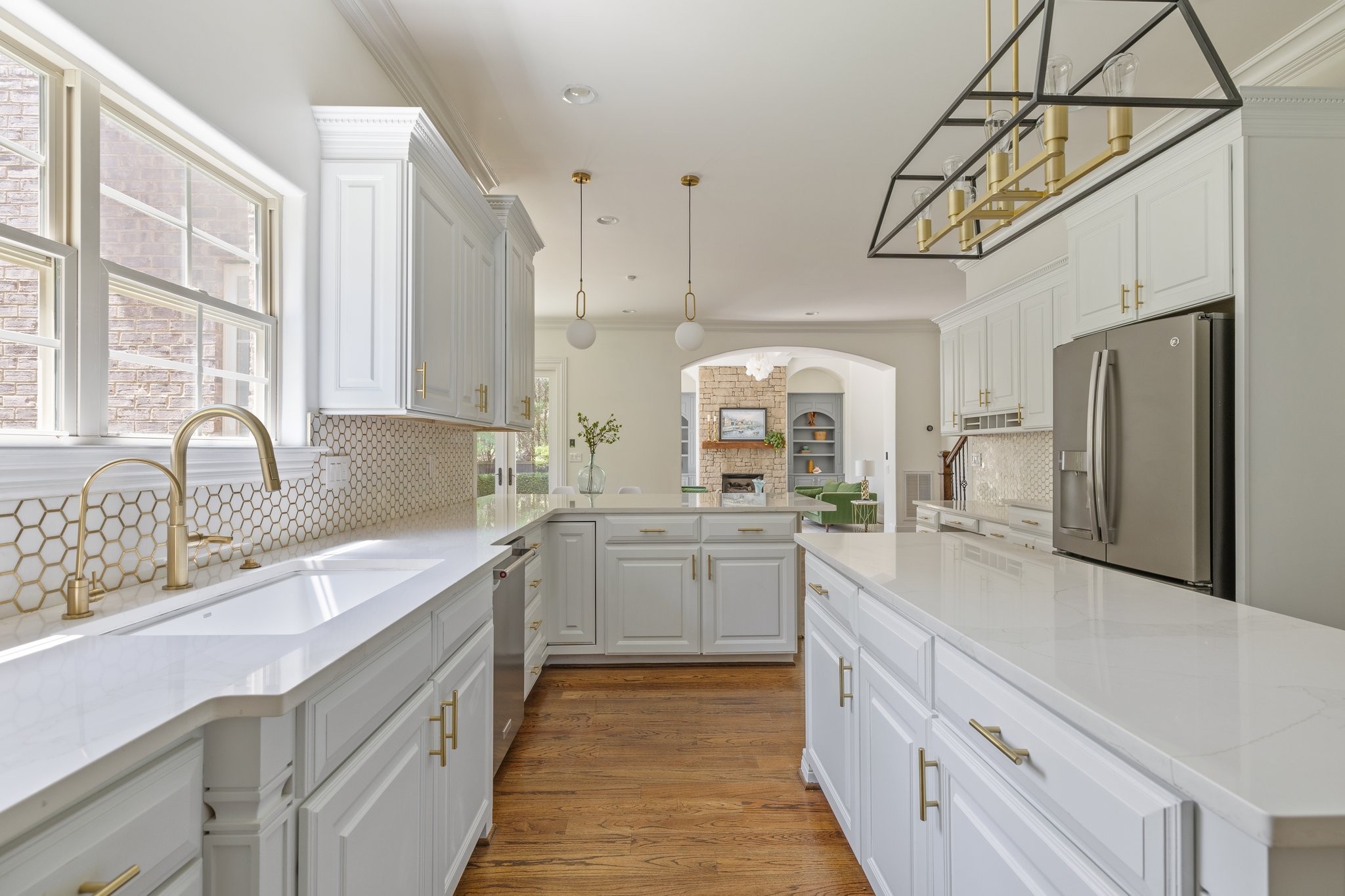 4409 Savage Pointe Drive Franklin, TN 37064 - Photo 20 of 70 a large kitchen with a sink and cabinets