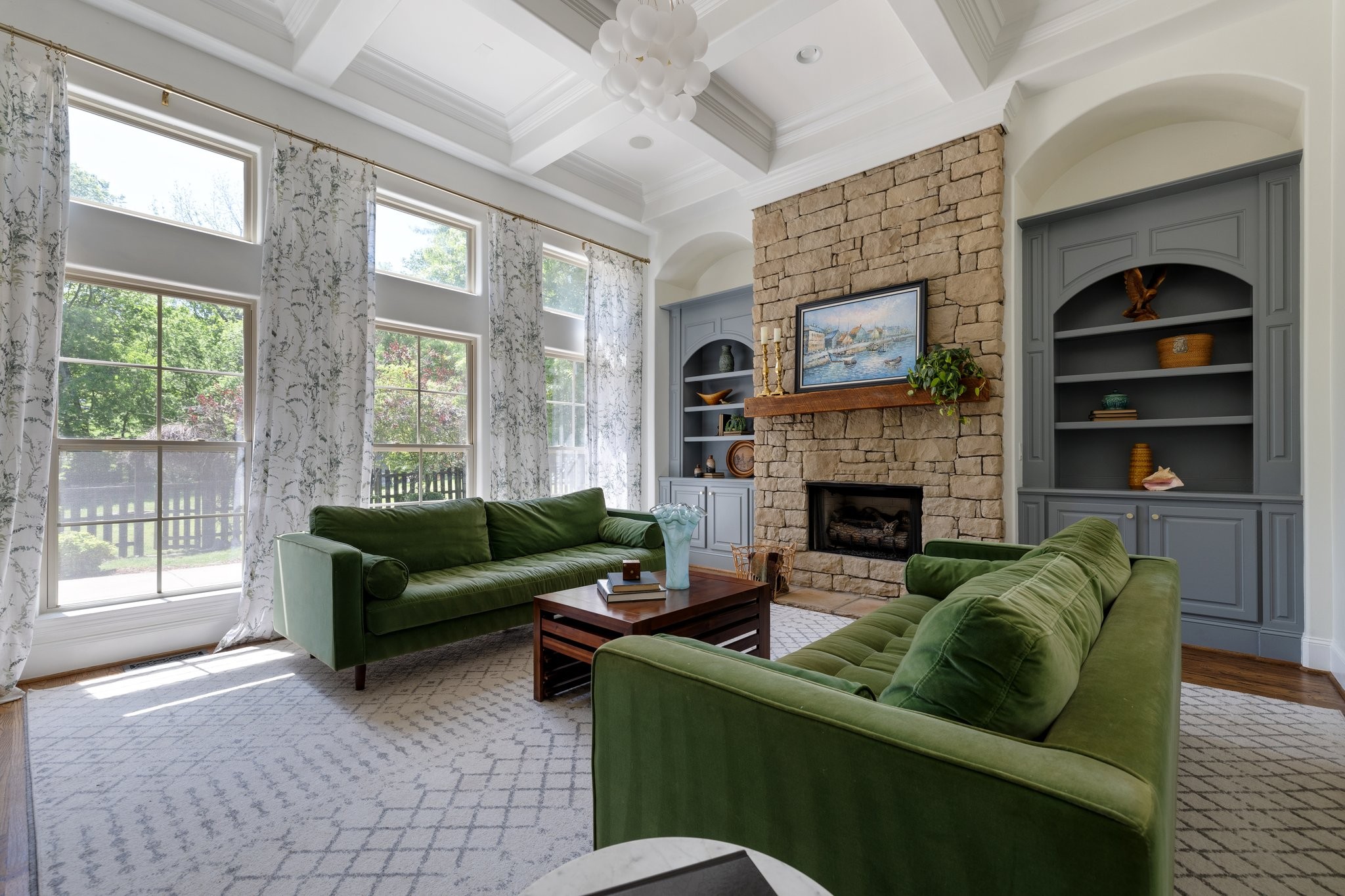 4409 Savage Pointe Drive Franklin, TN 37064 - Photo 33 of 70 a living room with furniture a flat screen tv and a fireplace