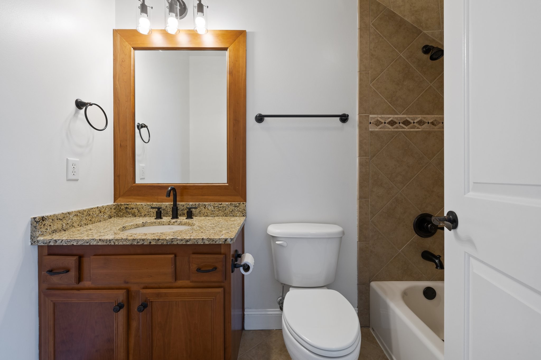 4409 Savage Pointe Drive Franklin, TN 37064 - Photo 43 of 70 a bathroom with a granite countertop sink toilet and shower