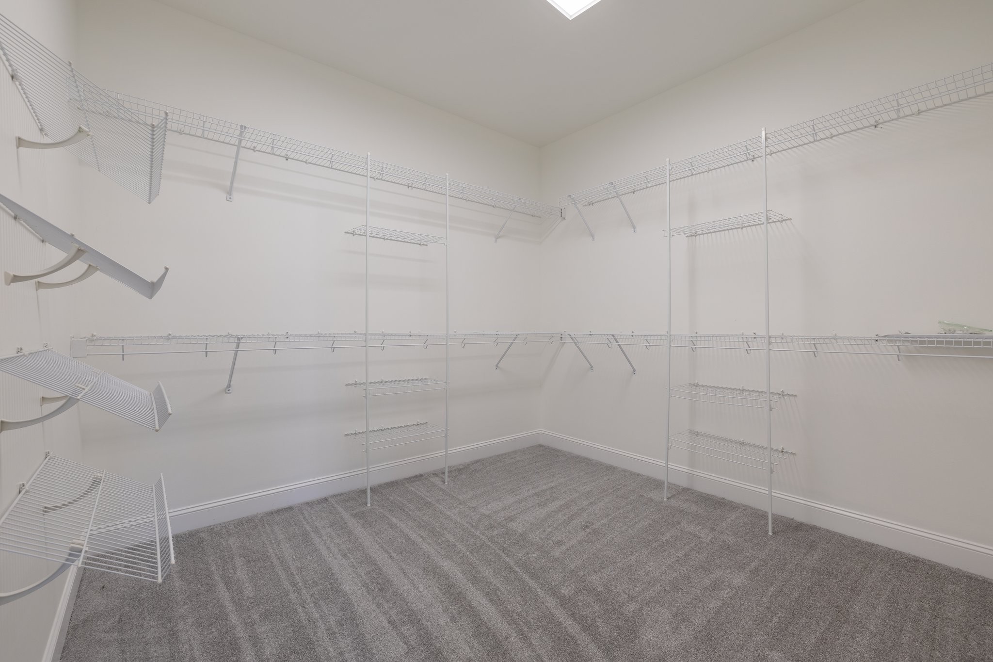 4409 Savage Pointe Drive Franklin, TN 37064 - Photo 56 of 70 a view of a room with racks on the wall