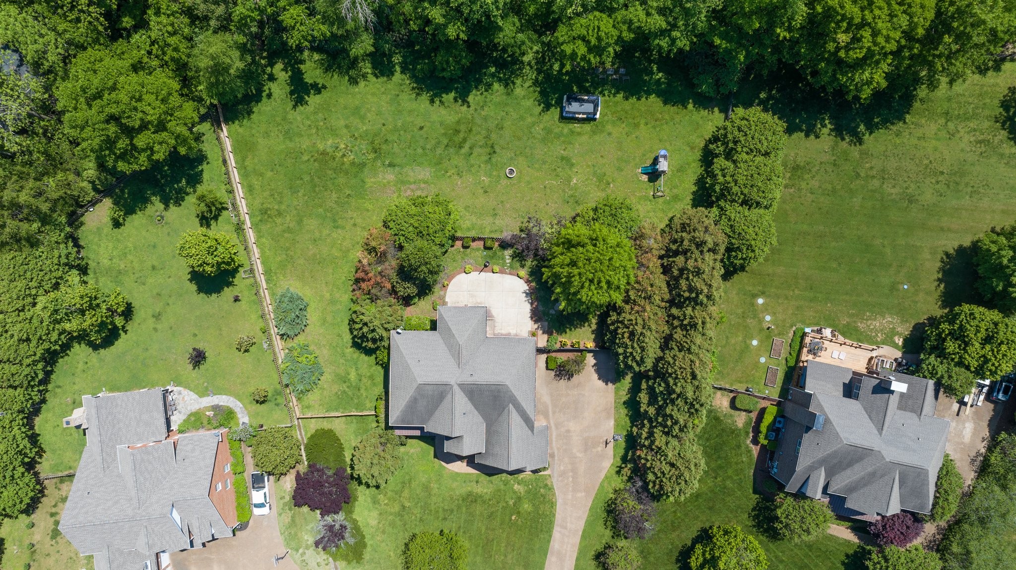 4409 Savage Pointe Drive Franklin, TN 37064 - Photo 65 of 70 an aerial view of a house with a yard and lake view