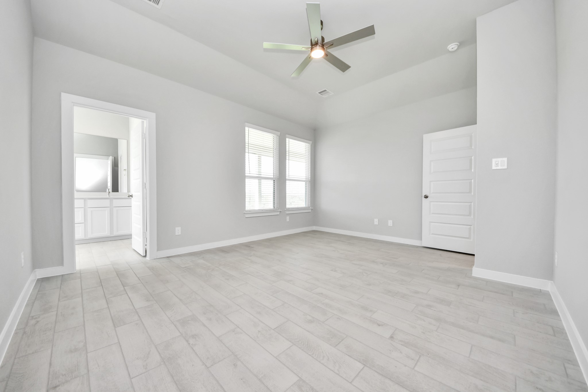 2910 Burris Park Drive Spring, TX 77373 - Photo 20 of 34 Another perspective unveils a comprehensive view of the serenity and comfort this primary suite offers. Sample photo of completed home with similar floor plan. Actual colors and selections may vary.
