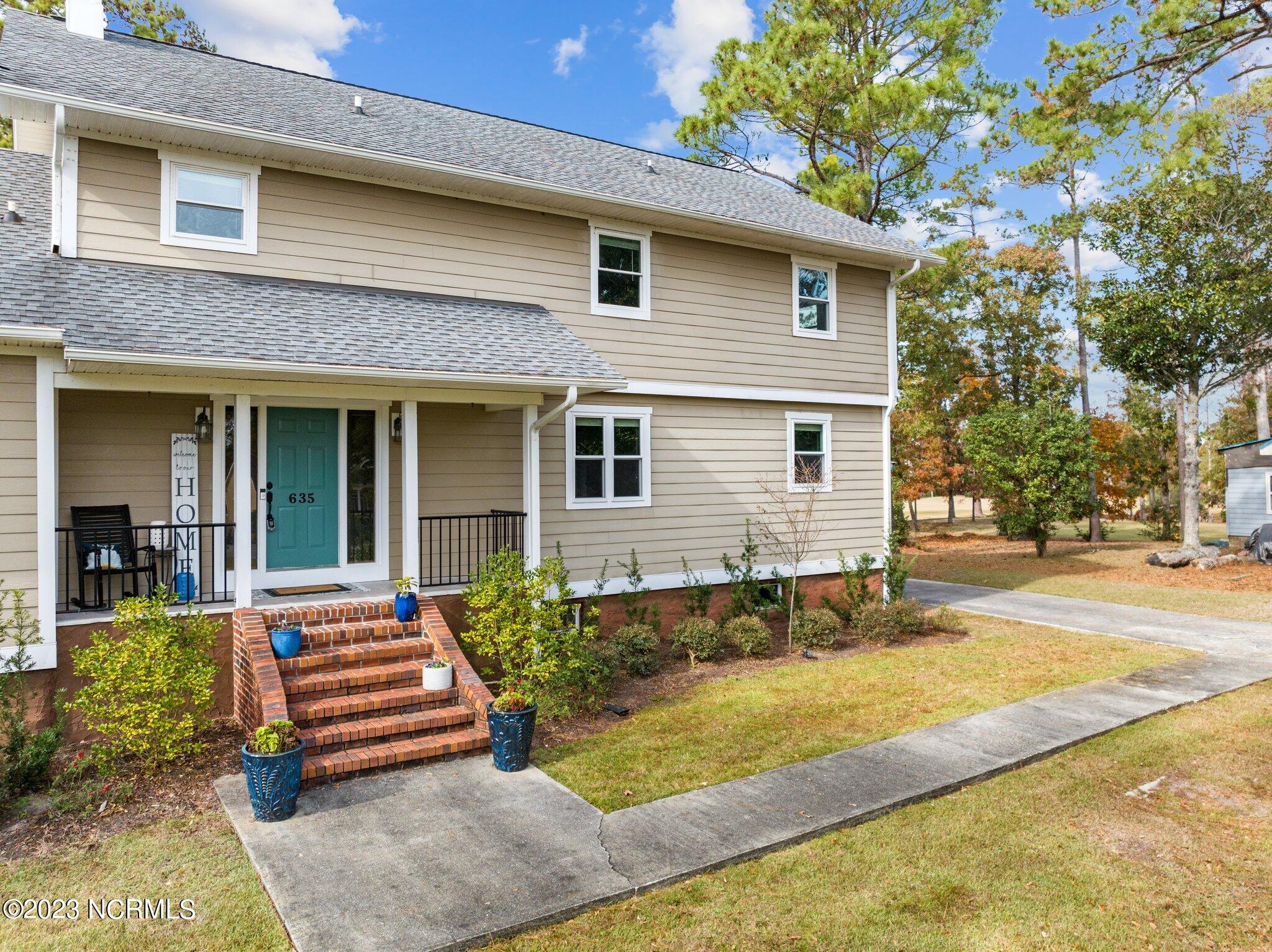 635 Ravenswood Road Hampstead, NC 28443 - Photo 3 of 77 3-web-or-mls-DJI_0159