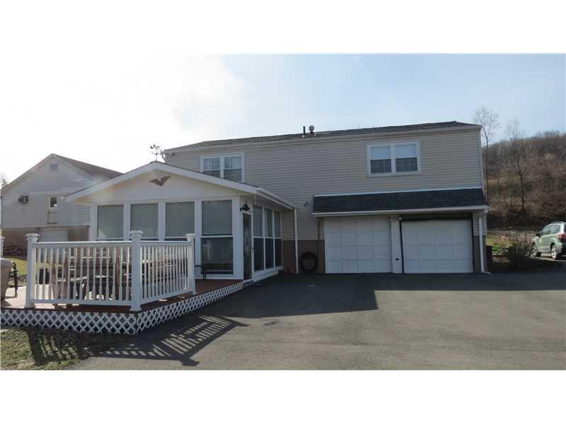 569 Pine Run Road Apollo, PA 15613 - Photo 3 of 8 Exterior Back. The deck and 3 season room are recent additions to the exterior of this property, and are a wonderful place to enjoy the deep back yard. Paved driveway has a convenient turn-around area .