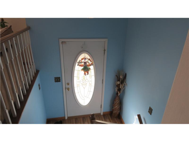 569 Pine Run Road Apollo, PA 15613 - Photo 5 of 8 Entry/Foyer. The traditional split entry foyer is a bright space with newly-installed wood flooring and pretty front door.