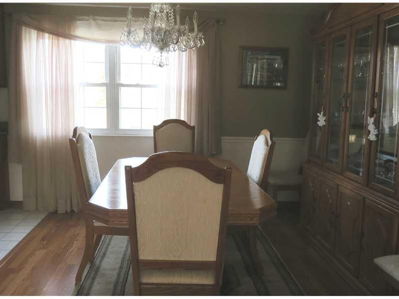 569 Pine Run Road Apollo, PA 15613 - Photo 7 of 8 Dining Room. The dining area is located just off the living room and kitchen. It is newly painted and has newer windows and flooring.