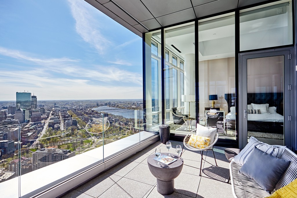 a view of swimming pool from a balcony