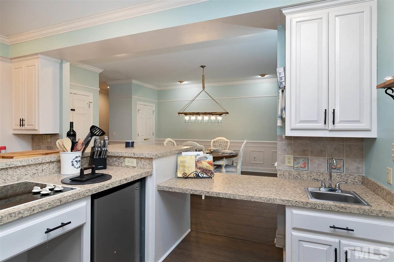 34 Gray Hawk Trail Rougemont, NC 27572 - Photo 8 of 30 a kitchen with granite countertop a sink cabinets and stainless steel appliances
