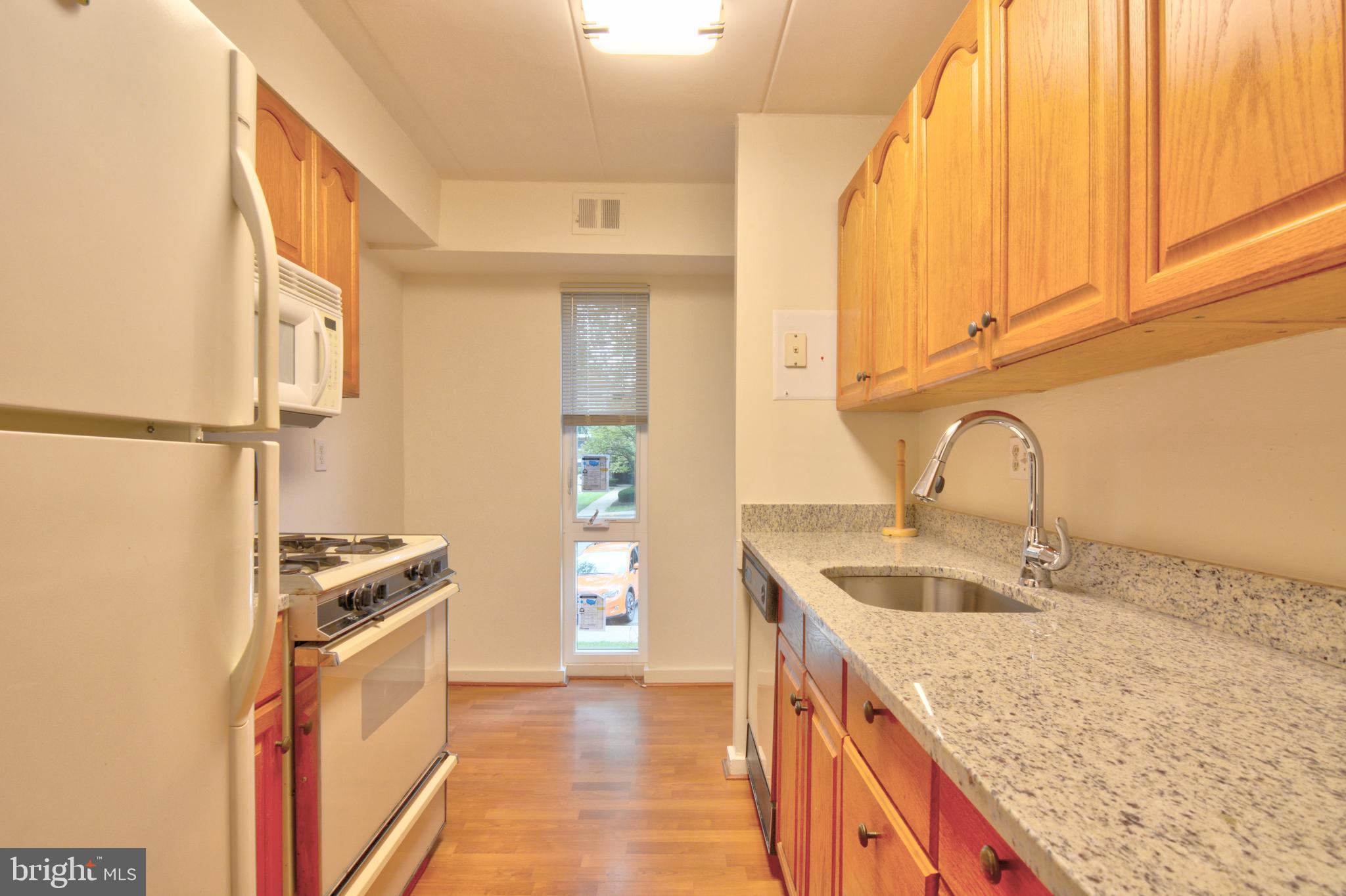 3344 Hewitt Avenue, Unit 22A Silver Spring, MD 20906 - Photo 5 of 27 New Granite Counter top, sink and faucet