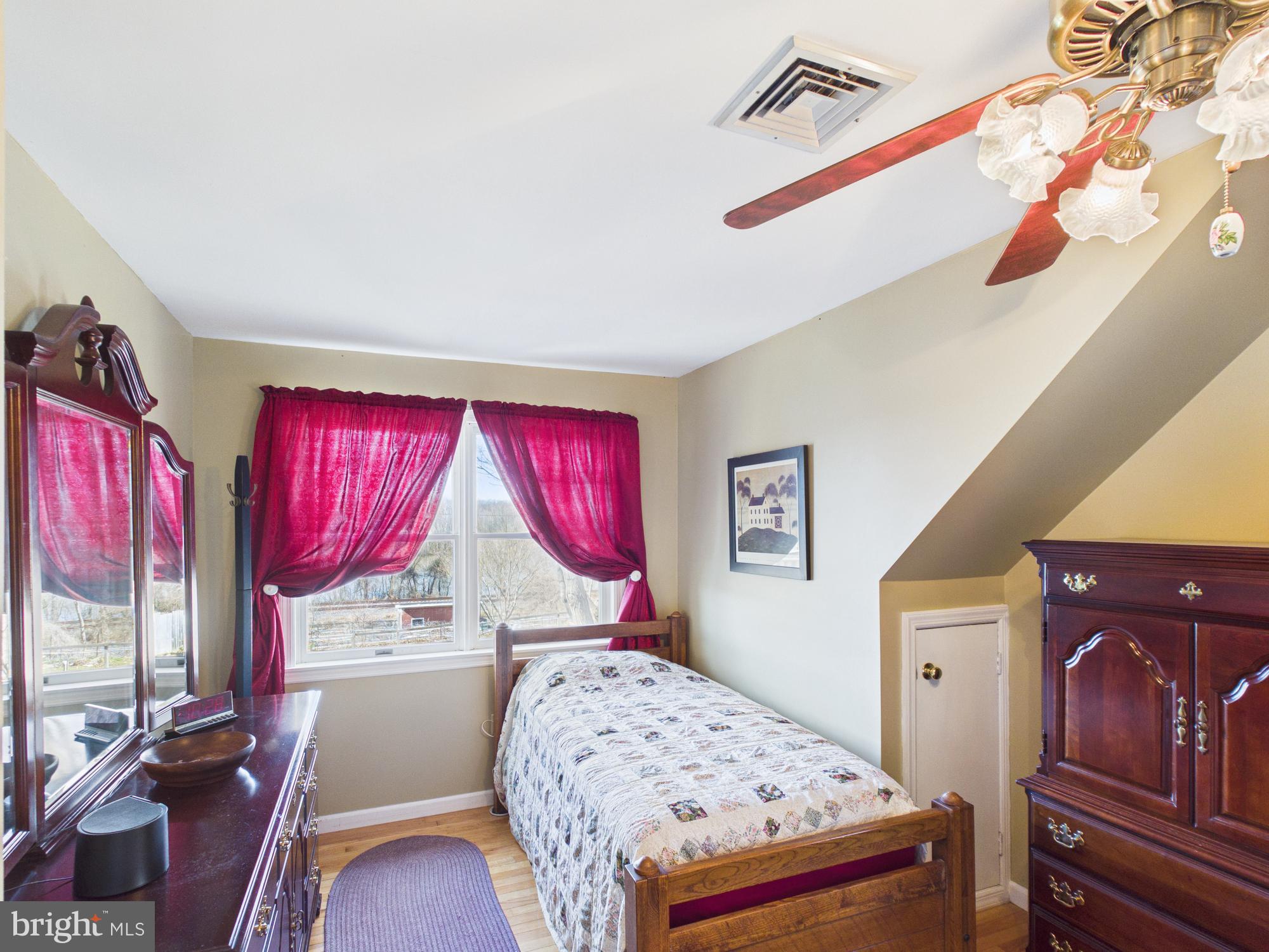 2175 River Road Washington Boro, PA 17582 - Photo 16 of 25 a bedroom with a bed window and dresser