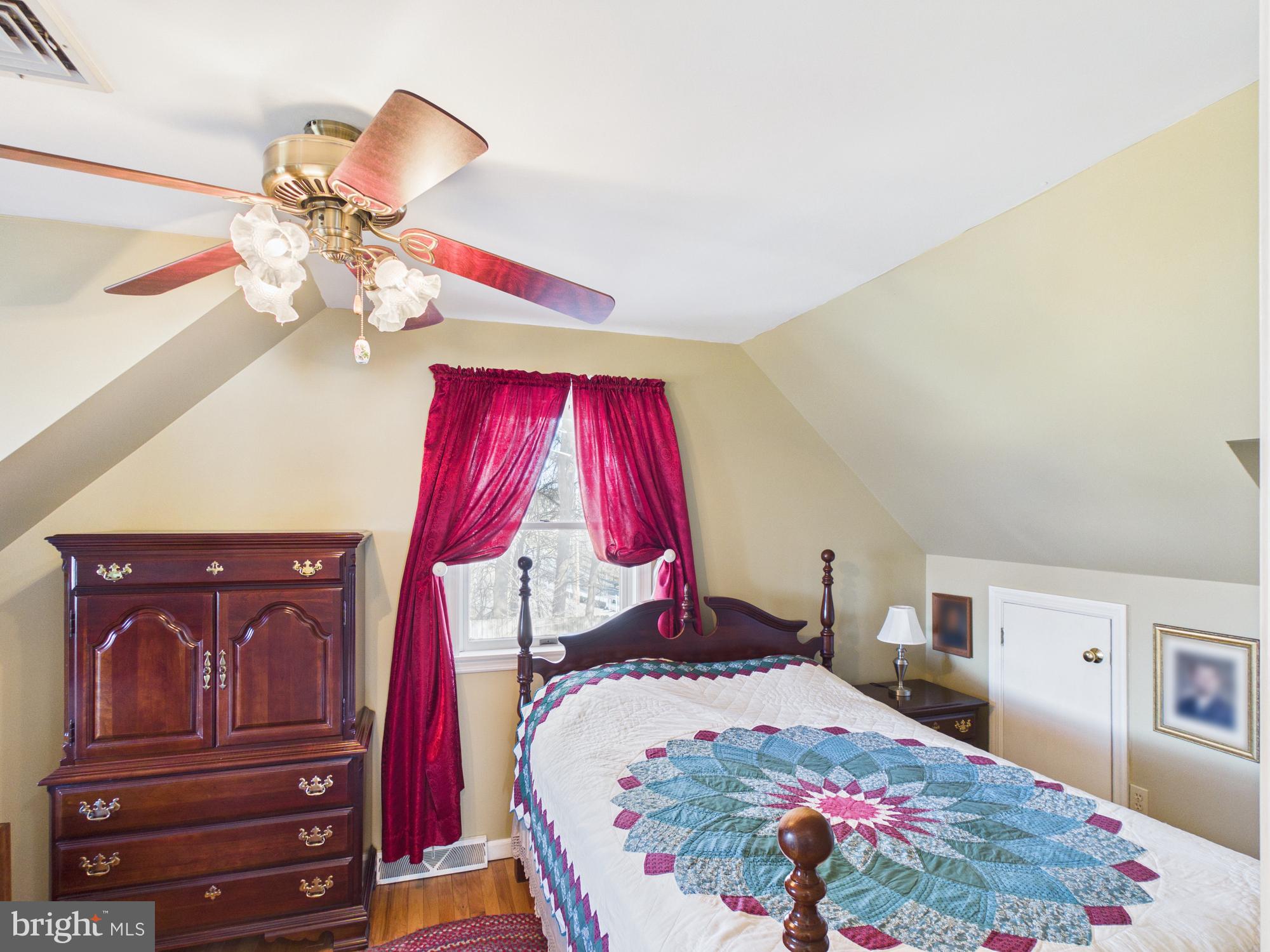 2175 River Road Washington Boro, PA 17582 - Photo 17 of 25 a bedroom with a bed and dresser with mirror