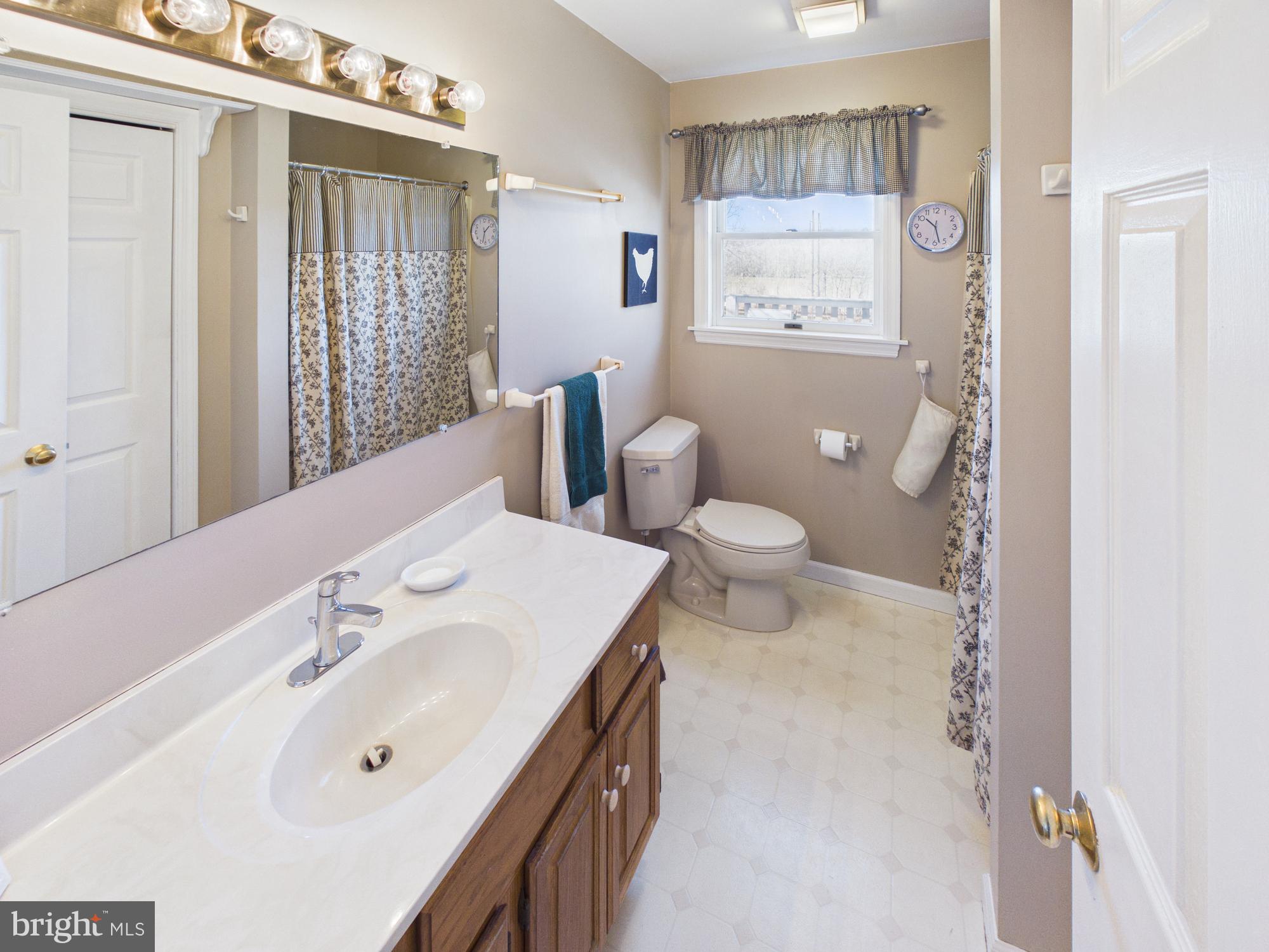 2175 River Road Washington Boro, PA 17582 - Photo 18 of 25 a spacious bathroom with a sink a toilet and shower