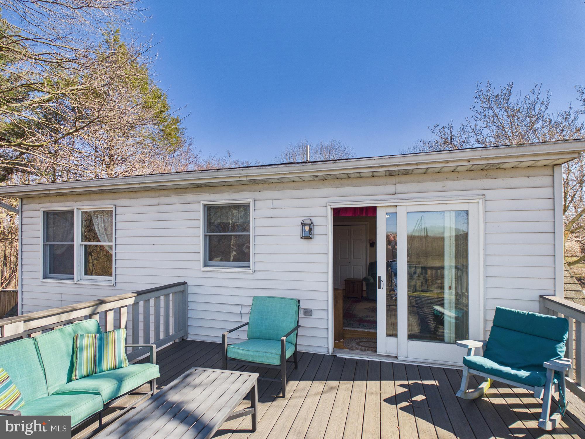 2175 River Road Washington Boro, PA 17582 - Photo 21 of 25 a view of a two chairs in the deck