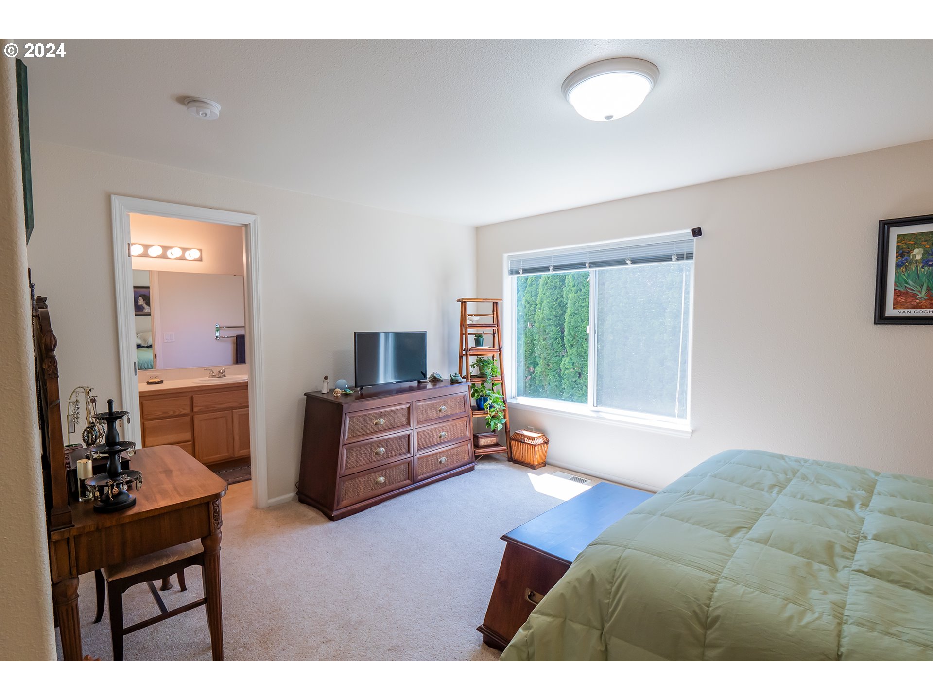 3582 Korbel Street Eugene, OR 97404 - Photo 16 of 32 a bedroom with furniture and a window